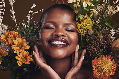 Buy stock photo Skincare, cosmetics and protea with the face of a black woman in studio on brown background for natural treatment. Smile, plant or beauty and a happy model for eco or aesthetic wellness with flowers
