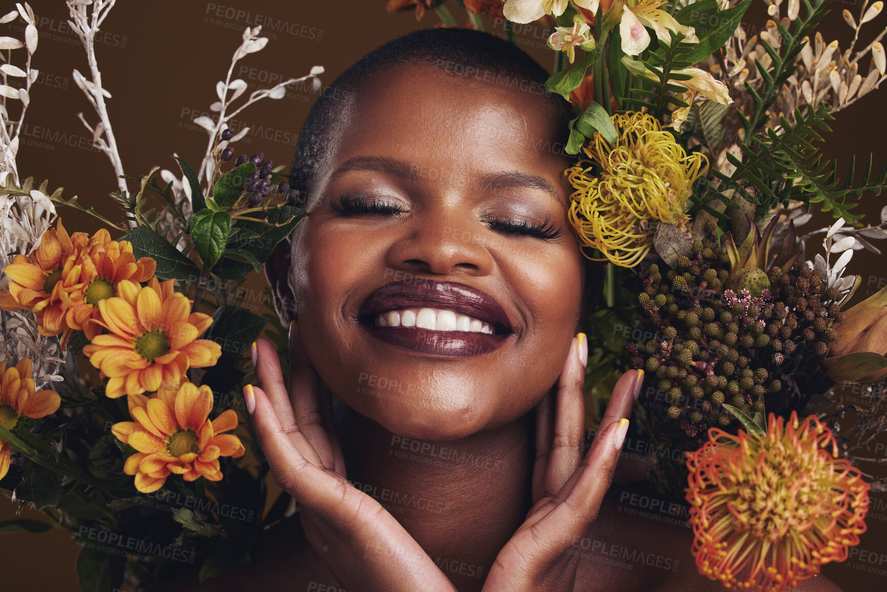 Buy stock photo Skincare, cosmetics and protea with the face of a black woman in studio on brown background for natural treatment. Smile, plant or beauty and a happy model for eco or aesthetic wellness with flowers