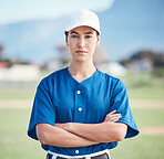 Sports, portrait and woman with arms crossed for baseball field training, workout or match. Fitness, face and softball player at a park proud, serious and mindset focus against blurred background