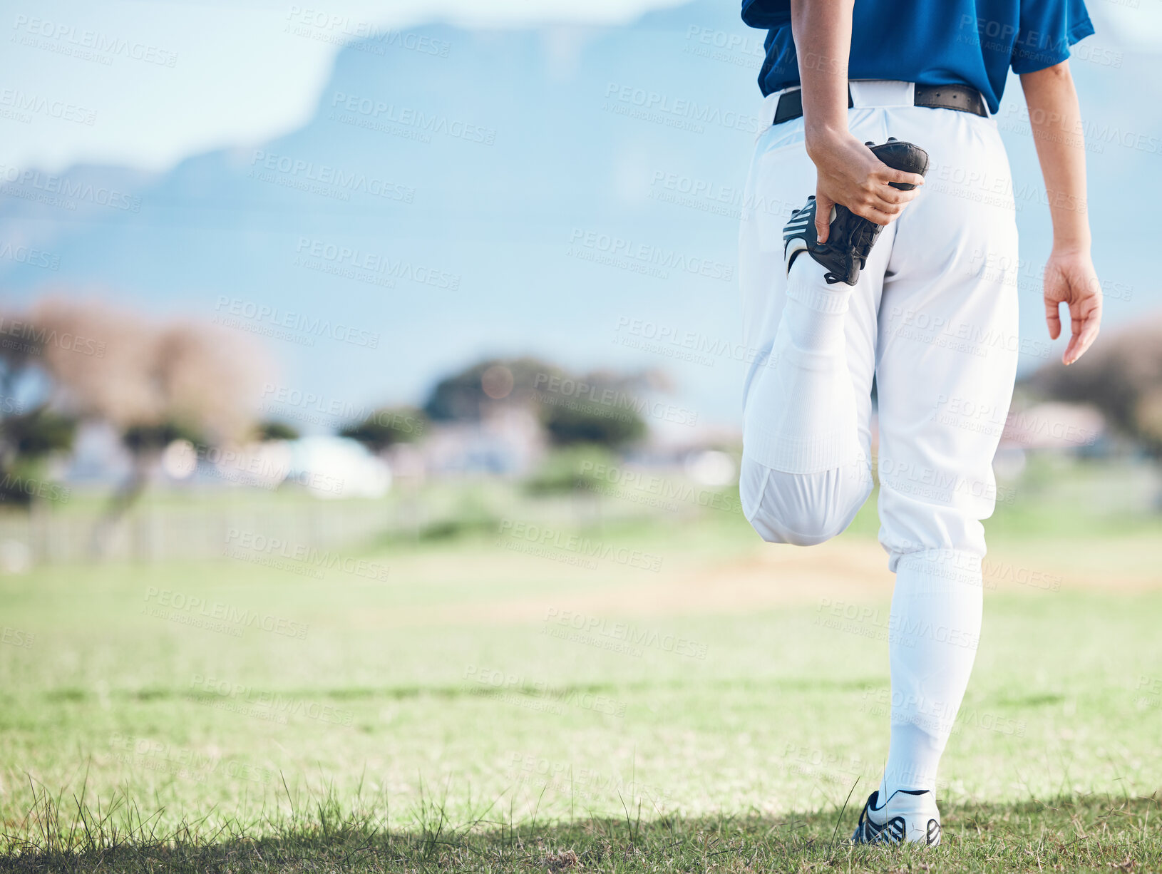 Buy stock photo Back, baseball and athlete stretching legs at field outdoor in healthy body exercise. Warm up, hands and person prepare in sports training, wellness workout and fitness to start softball mockup space