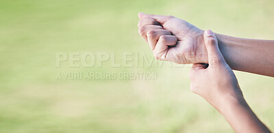 Buy stock photo Wrist pain, sports person and hands injury from grass pitch challenge, lawn field workout or exercise problem or mistake. Medical emergency mockup, joint sprain or closeup athlete with muscle anatomy