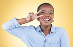 Happy, portrait and a black woman with a peace sign on a studio background for fun personality. Cool, happy and an African girl or young person with a crazy hand gesture isolated on a studio backdrop