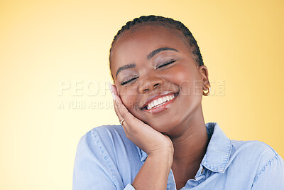 Buy stock photo Happy, black woman and skincare, touch and beauty in studio isolated on a yellow background mockup space. Smile, natural and African model in cosmetic facial treatment, health aesthetic and wellness