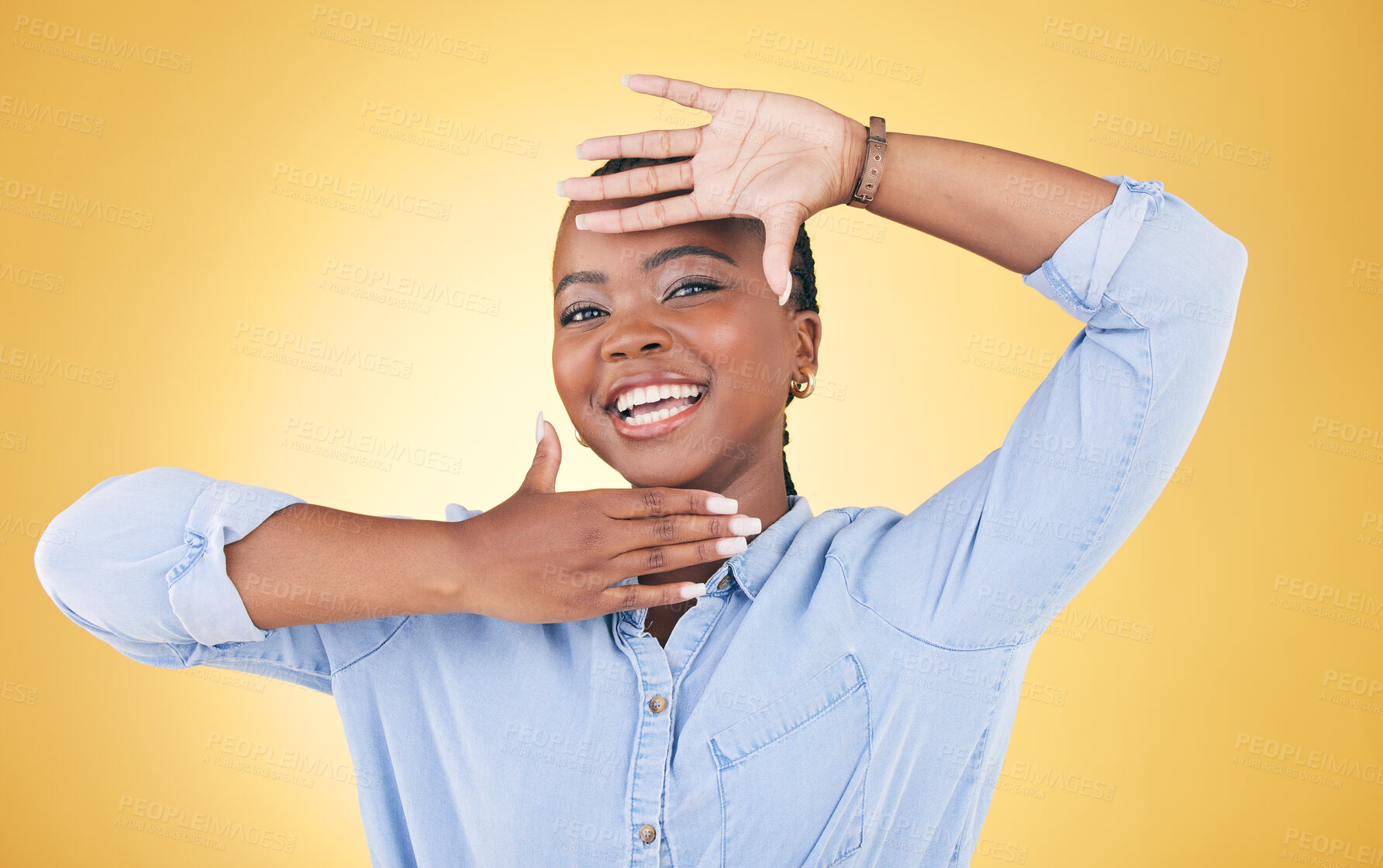 Buy stock photo Hands, frame and portrait of happy black woman in studio for confident, creativity and beauty. Photography, perspective and face of African person on yellow background in cosmetics, makeup or glamour