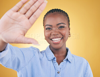 Buy stock photo Selfie, smile and portrait of black woman in studio for motivation, social media and influencer. Happy, freedom and profile picture with face of person on yellow background for post and happiness