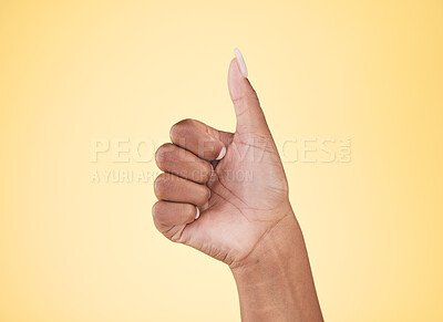 Buy stock photo Woman, hands and thumbs up in winning, success or approval against a studio background. Closeup of female person with like emoji, yes sign or okay in thank you, agreement or finger gesture on mockup