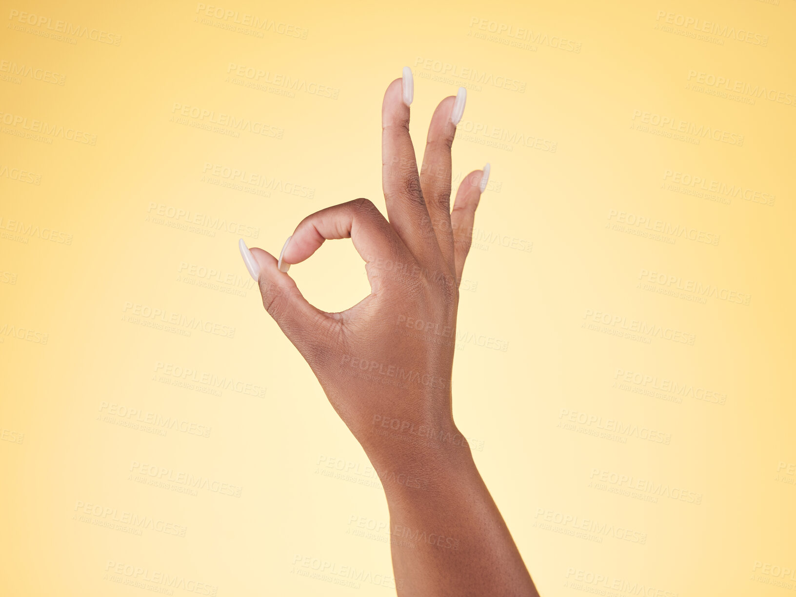 Buy stock photo Great, ok and hand sign  in studio with decision, agreement and success of good news. Yellow background, yes vote and accept approval of a person showing agree, opinion and emoji icon and signal