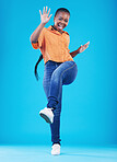 Woman, excited and leg up to celebrate in studio for achievement, promotion or sale deal. Portrait of African person on a blue background for happiness, winning and good news or fashion announcement