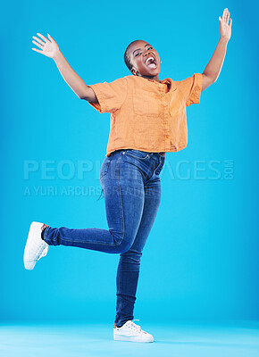 Buy stock photo Winner, excited or portrait of black woman jump on blue background with energy, joy or smile in studio. Happy, celebration or African person screaming for freedom, success or winning lottery jackpot