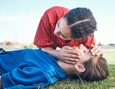 Buy stock photo CPR, breathing check and saving woman on field for sport, fitness and game with accident and emergency. Training, paramedic and listening to lungs for breathe from injury with first aid and athlete