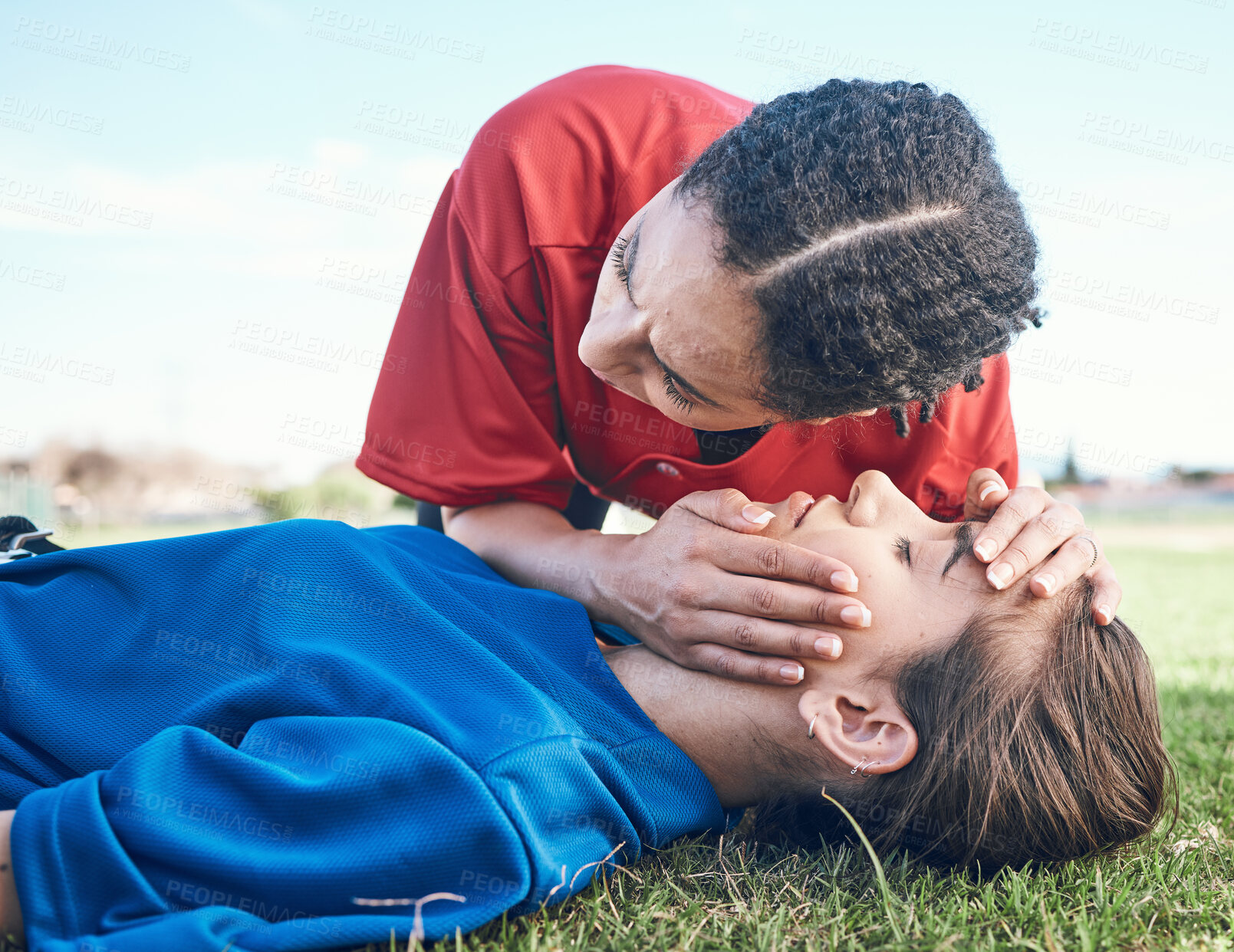 Buy stock photo CPR, breathing check and saving woman on field for sport, fitness and game with accident and emergency. Training, paramedic and listening to lungs for breathe from injury with first aid and athlete