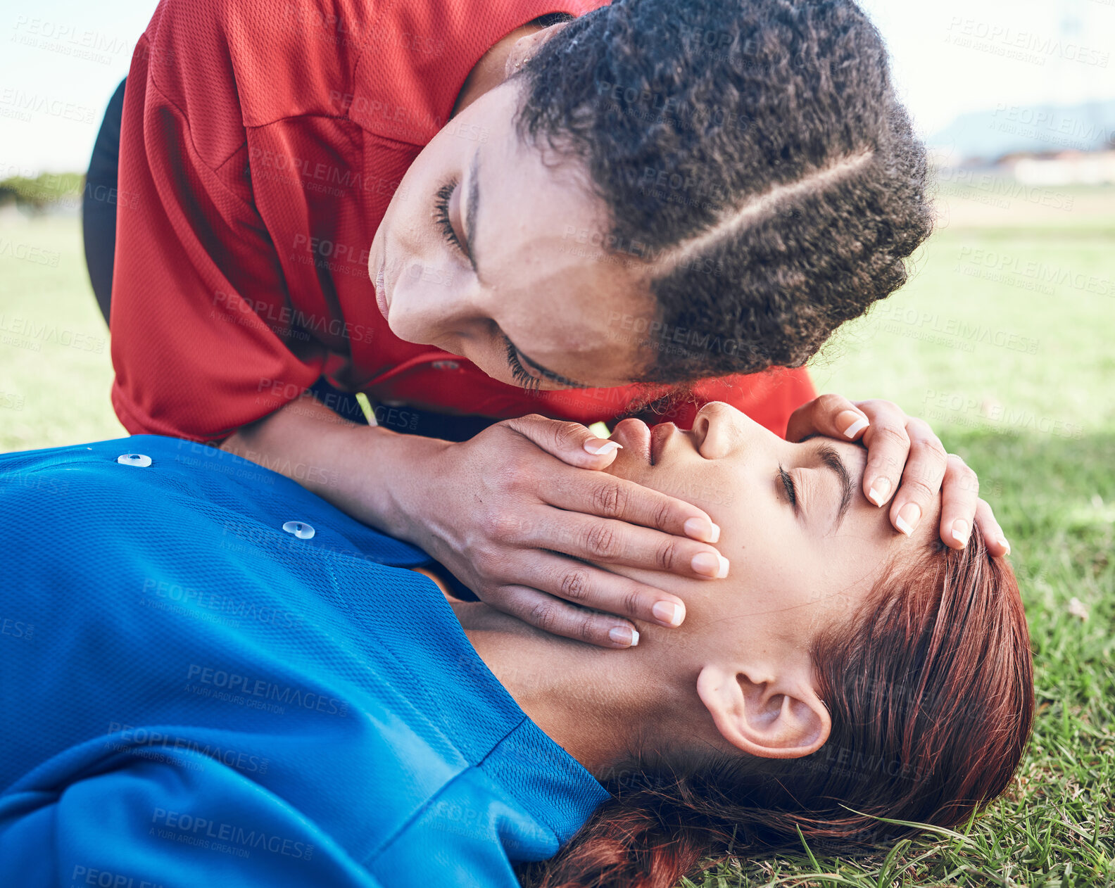 Buy stock photo CPR, breathing check and woman on field for sport, fitness and game with accident and emergency. Training, paramedic and listening to lungs for breathe from injury with first aid and athlete outdoor