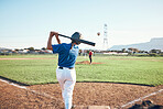 Baseball, bat and person swing at ball outdoor on a pitch for sports, performance and competition. Behind athlete or softball player ready for game, training or exercise challenge at field or stadium