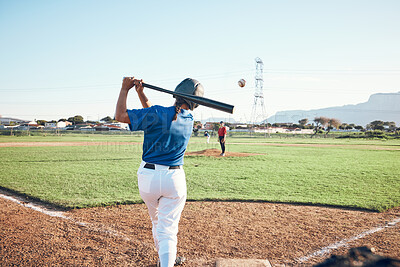 Baseball, bat and person swing at ball outdoor on a pitch for sports, performance and competition. Behind athlete or softball player ready for game, training or exercise challenge at field or stadium