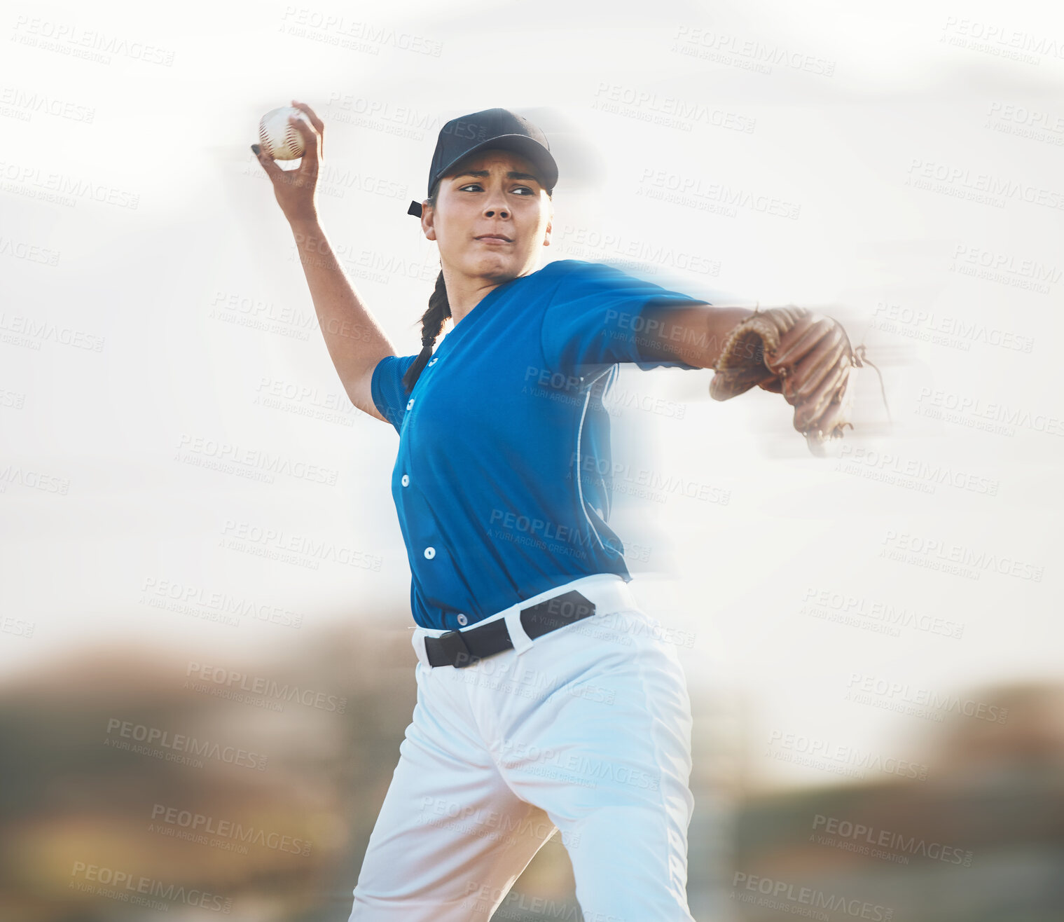 Buy stock photo Baseball, ball and a woman pitching outdoor on a sports pitch for performance and competition. Professional athlete or softball pitcher with fitness for game, training or exercise on field or stadium