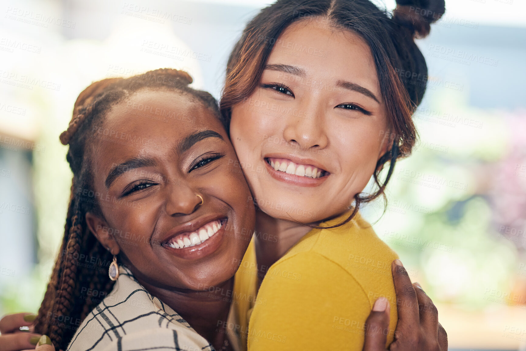 Buy stock photo Face, smile and lesbian couple hug in home, bonding and having fun together. Portrait, gay and happy women embrace in love, care or respect, trust or support in commitment, loyalty and interracial
