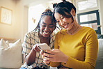 Young women, funny meme and smartphone, friends relax at home with social media and communication. Gen z, happiness and comedy online, chat and using phone with people on couch, mobile app and tech