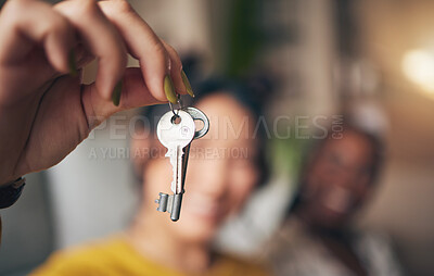 Buy stock photo Keys, hand and new home or people moving in together for real estate investment. Rent, mortgage and loan as homeowner celebrate at apartment, property or house with a partner for freedom or security