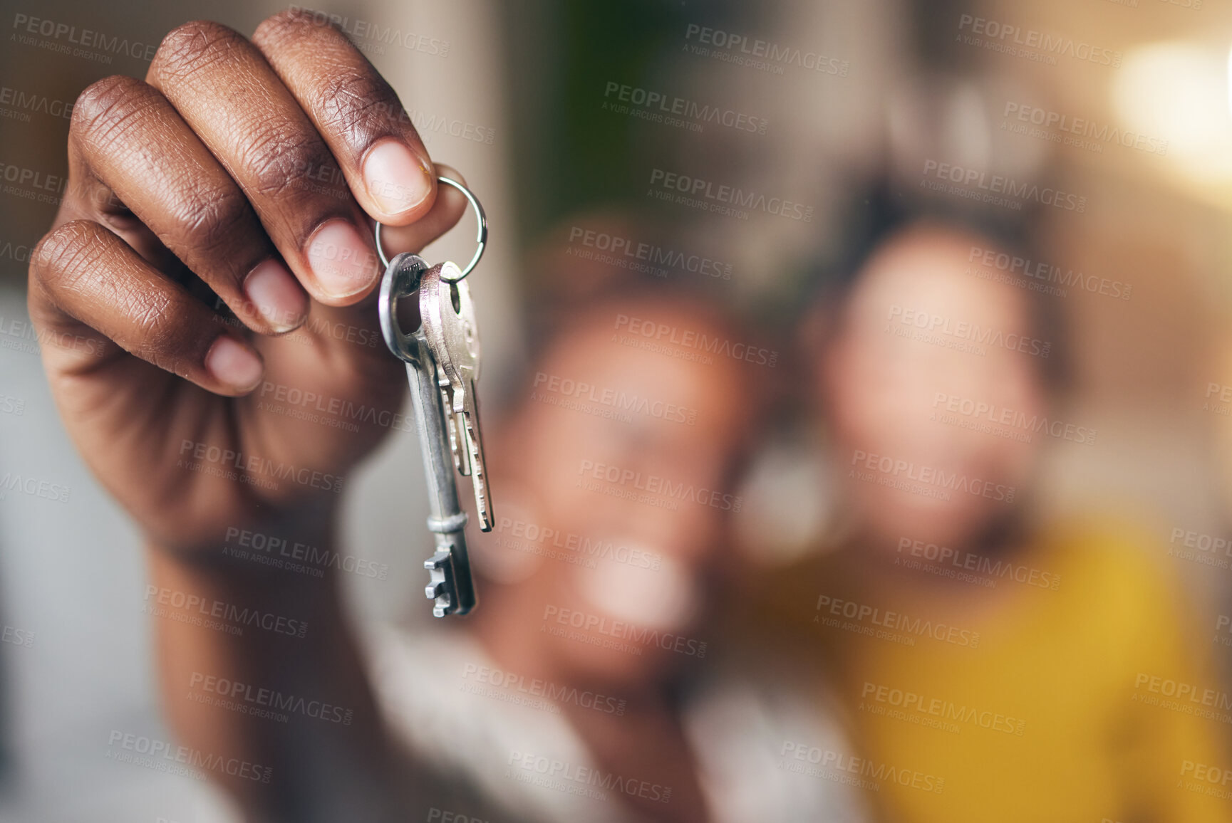 Buy stock photo New home, hand and keys with people moving in together for real estate investment. Rent, mortgage and loan as homeowner celebrate at apartment, property or house with partner for freedom or security