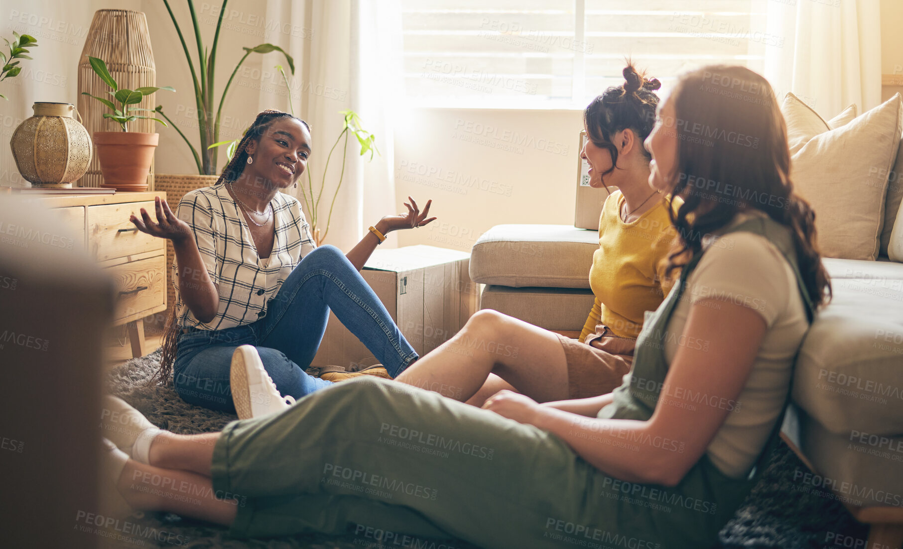 Buy stock photo Happy, gossip and friends on a floor relax, talking and bond with advice in house together. Conversation, drama and women with diversity in a living room speaking, chilling and enjoy weekend freedom