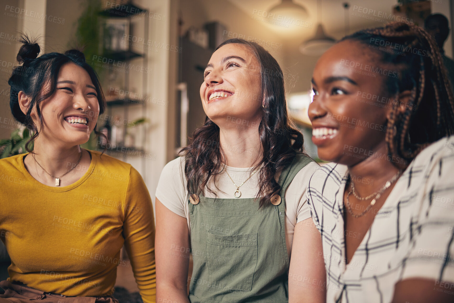 Buy stock photo Happy, friends and women in a living room with funny, conversation and bond in their home together. Gossip, smile and people with diversity in a house for reunion, weekend and relax on day off