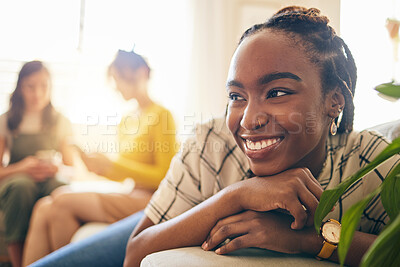 Buy stock photo Happy, thinking and black woman relaxing in the living room with her friends in modern apartment. Happiness, positive and young African female person dreaming and sitting in lounge for rest at home.