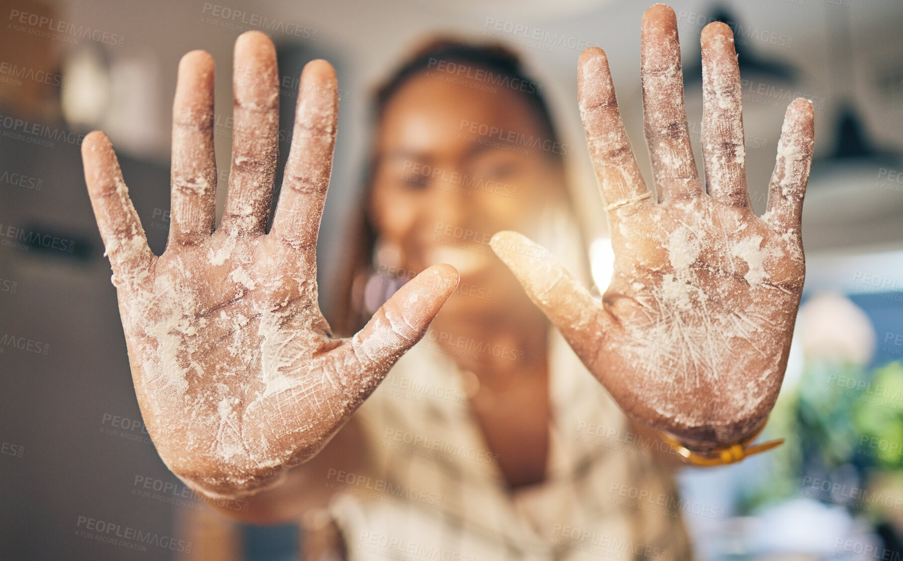 Buy stock photo Hands, flour and baking by woman in a kitchen for bread, pizza or handmade food at home. Wheat, palm and female chef with messy fingers from cooking, fun and preparing diy, pasta or cake in her house