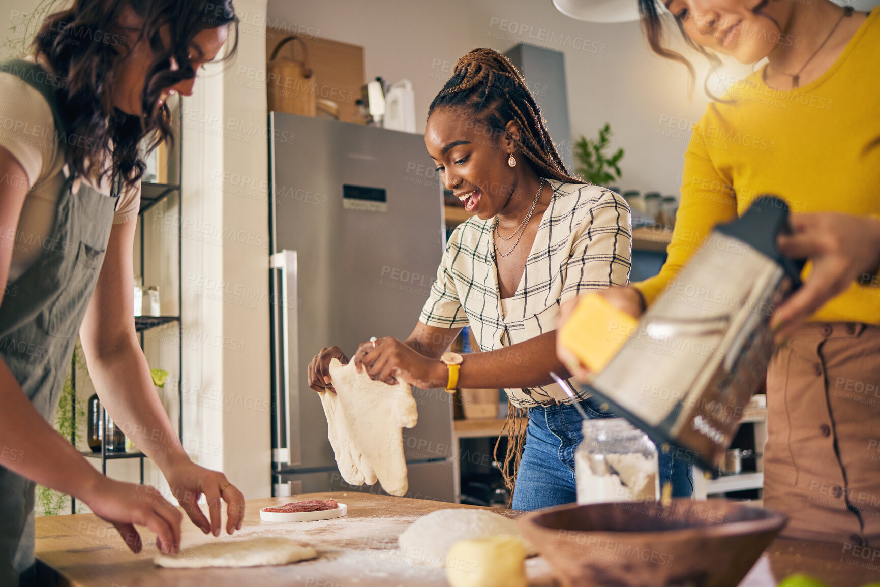 Buy stock photo Cooking, friends and food with women in kitchen for pizza, support and nutrition. Happy, bonding and help with group of people and preparing lunch at home for conversation, diversity and health