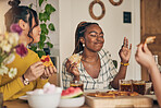 Food, drinks and pizza party, women and dinner, friends and fun with eating and nutrition at home. Italian cuisine, fruit and sweets with social gathering, happy and young people have meal together