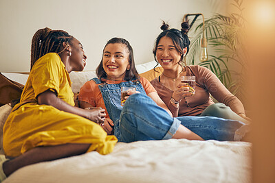 Buy stock photo Friends, conversation and women with drink in home for relaxing, bonding and talking together. Friendship, happy and group of people laughing for relationship, visit and chat on sofa in living room
