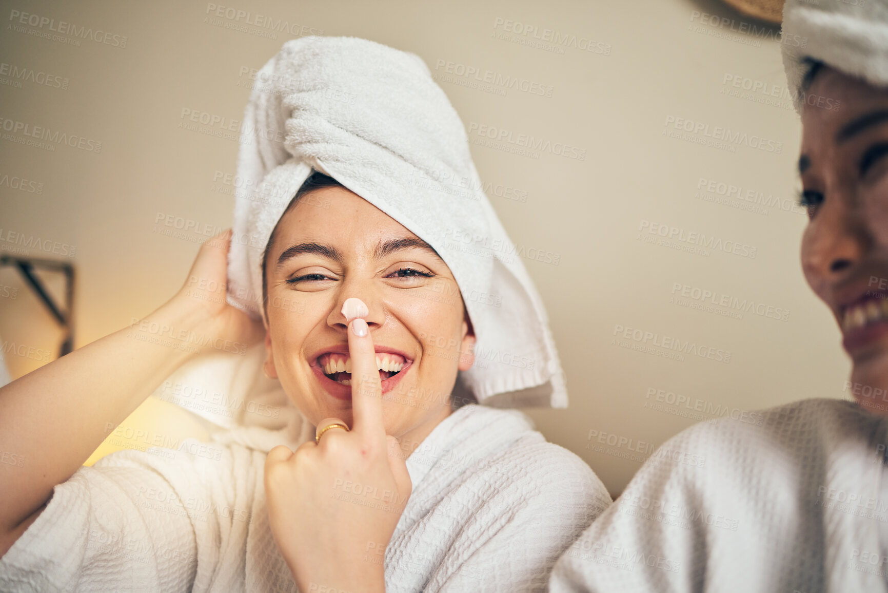 Buy stock photo Happy, portrait and friends with a spa day in a house with cream for skincare and wellness. Smile, relax and women with lotion or sunscreen for facial health, playful and bonding with beauty therapy