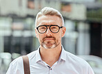 Mature business man, city and portrait with glasses, bag and ready for walk, travel and outdoor in metro. Entrepreneur, CEO or manager in road, traffic or sidewalk with pride on serious face in Milan