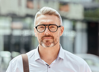 Buy stock photo Mature business man, city and portrait with glasses, bag and ready for walk, travel and outdoor in metro. Entrepreneur, CEO or manager in road, traffic or sidewalk with pride on serious face in Milan