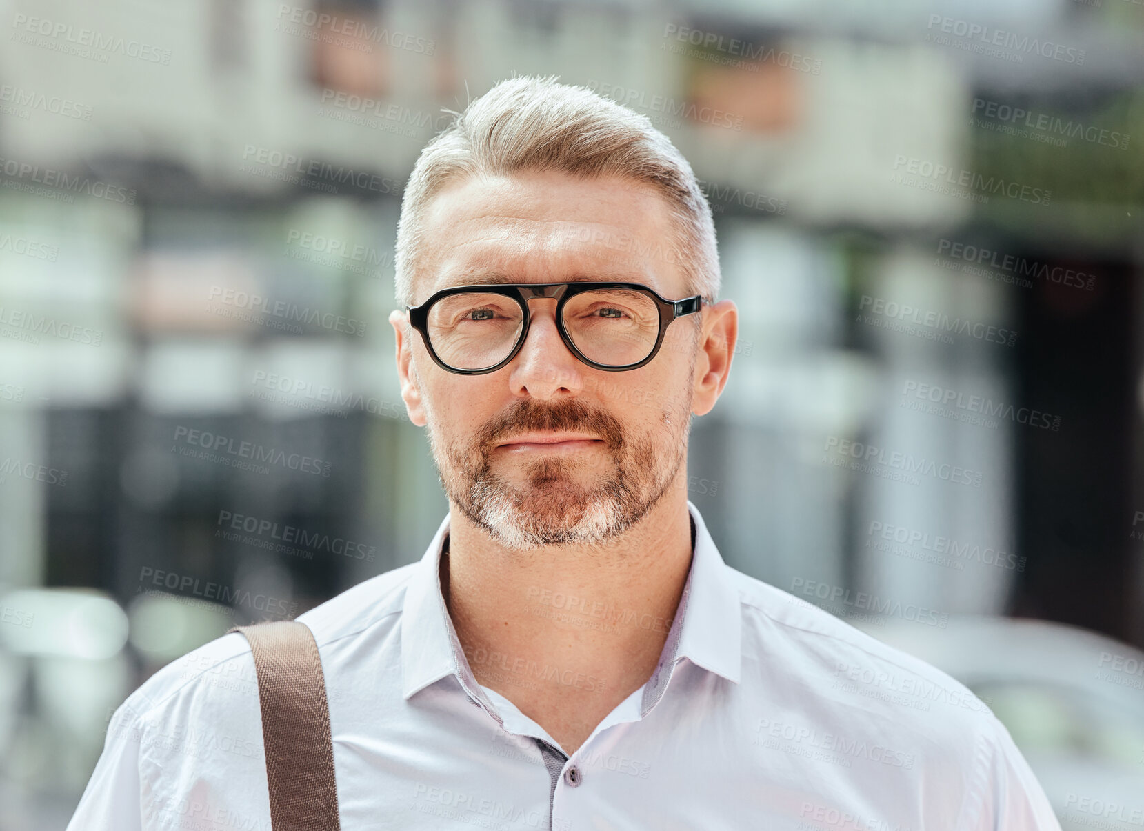 Buy stock photo Mature business man, city and portrait with glasses, bag and ready for walk, travel and outdoor in metro. Entrepreneur, CEO or manager in road, traffic or sidewalk with pride on serious face in Milan