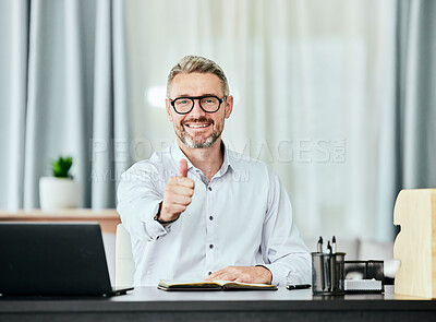 Buy stock photo Portrait, thumbs up and smile with a business man in his office for support, motivation or success. Thank you, yes emoji and goals with a happy professional manager working in a notebook at his desk