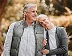 Relax, love and hug with old couple in nature for bonding, happy and support. Smile, happiness and retirement with senior man and woman walking in countryside park for vacation and commitment 