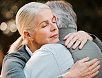 Old woman, face and senior couple hug, care and embrace with empathy, care and elderly marriage trust, love and support. Park, emotional connection and outdoor man, retirement wife or people hugging