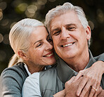 Love, travel and senior couple hug in a forest, happy and bond in nature on a weekend trip together. Smile, face and romantic old woman embrace elderly male in a forest, cheerful and enjoy retirement