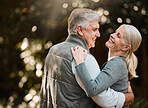 Smile, nature and senior couple dance, have fun and enjoy quality time together on woods, forest or romantic park date. Marriage, energy and elderly people care, support or bonding during retirement