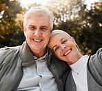 Love, portrait and senior couple hug in a forest, happy and bond in nature on a weekend trip together. Smile, face and romantic old woman embrace elderly male in woods, cheerful and enjoy retirement