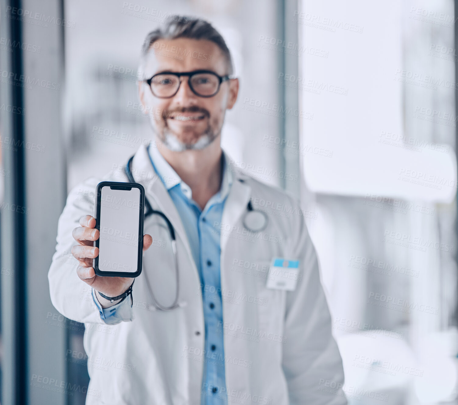 Buy stock photo Doctor, phone screen and mockup for healthcare presentation, communication or FAQ in hospital. Medical portrait of man with mobile app, advertising or ux design space for contact us or clinic sign up