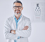 Portrait, eye exam and arms crossed with an optometrist man in his office for healthcare or vision improvement. Medical, frame and glasses with a happy doctor in a clinic for assessment and testing