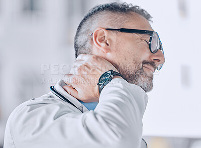 Buy stock photo Medical, neck pain or optometry and a doctor in his office with an injury while feeling stress. Healthcare, burnout or accident with a mature optician holding his spine or shoulder in a clinic