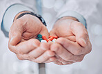 Hands, pills and doctor closeup or pharmacist with healthcare, medical or medicine drugs closeup. Hospital, clinic or pharmacy with pharmaceutical, wellness and virus prevention medication for care