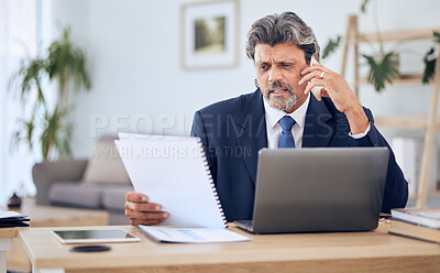 Buy stock photo Document, laptop and businessman on a phone call in the office while talking to a client. Discussion, technology and mature professional male lawyer on mobile conversation with paperwork and computer