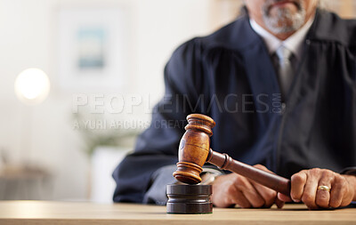 Buy stock photo Closeup, hands and judge with a gavel of law, rule for order and attention to justice with legal hearing. Zoom, person and lawyer with a hammer, decision and auction with constitution in courtroom