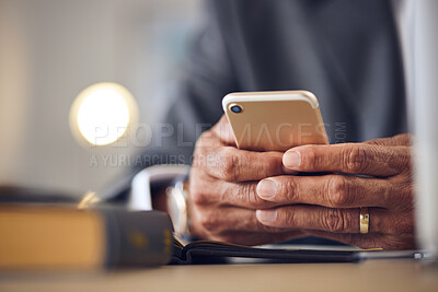 Buy stock photo Closeup hand, typing and a person with a phone for communication, email check or contact. Desk, work and a man with a mobile in an office for an online app, connection and reading a notification