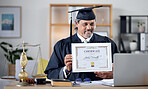 Laptop, video call and certificate with a man judge in his office, proud of an award as a law degree graduate. Computer, virtual and success with a mature legal student showing his prize to a webcam
