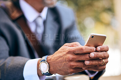 Buy stock photo Outdoor, hands and man with smartphone, business and connection with social media, typing or network. Person, employee or entrepreneur with a cellphone, closeup or mobile app with website information