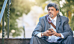 Phone, thinking and a business man on steps in the park during a work break for communication. Mobile, idea and mockup with a mature employee looking worried after job loss in a financial crisis